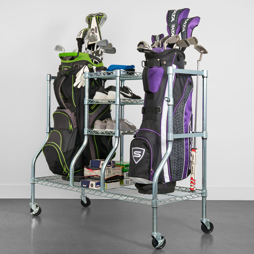 golf bag organizer holding two tour size golf bags, shoes, and golf accessories