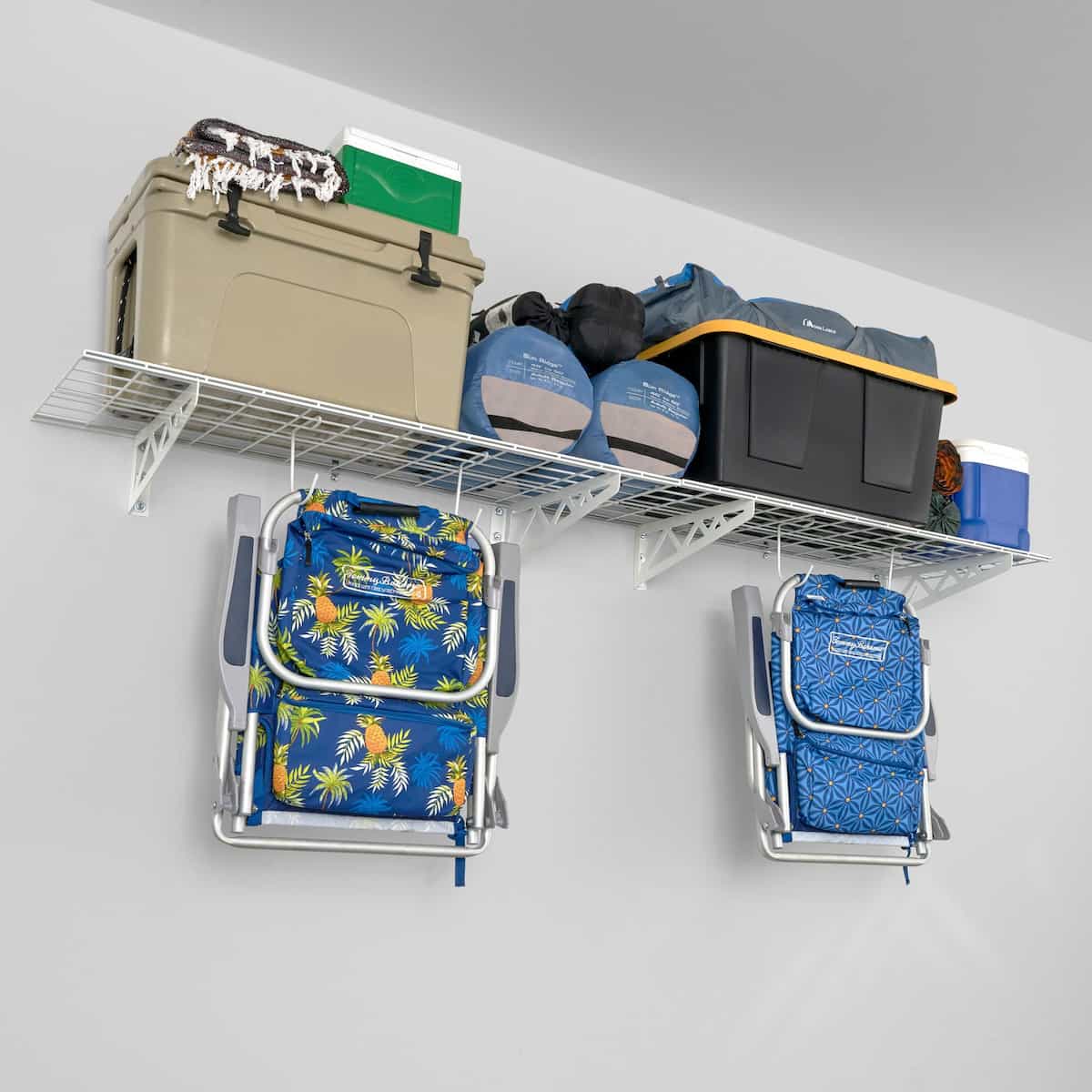 18" x 48" wall shelf set in white holding various items