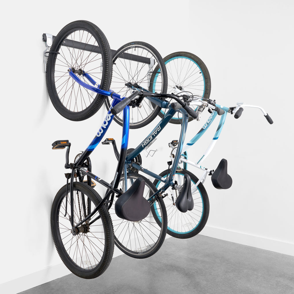 garage track system with bicycles hanging from adjustable bike hooks (7726746599638)