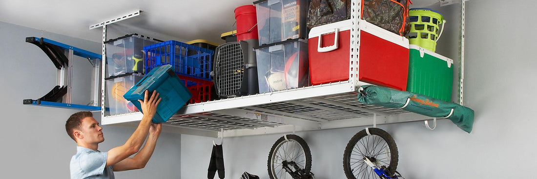 person loading overhead garage storage rack