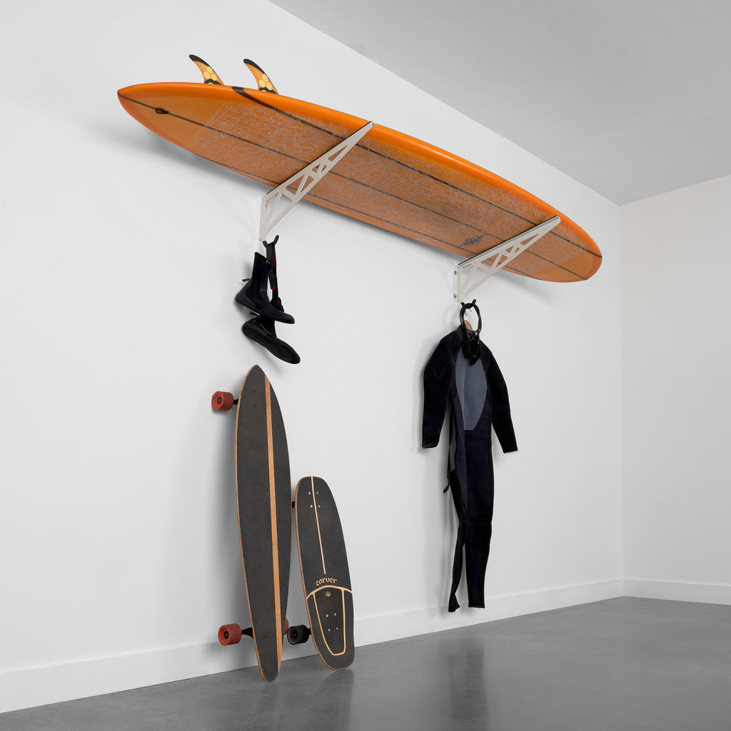surfboard rack holding a surfboard and surfing gear