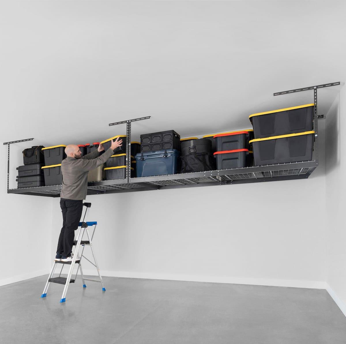 4' x 8' Overhead Storage Rack Combo with bins and man on ladder 