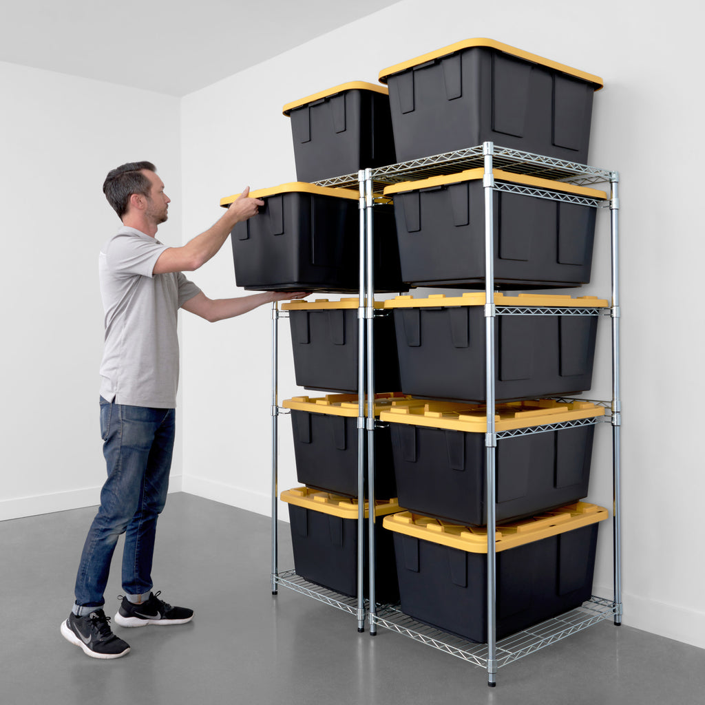 person removing storage bin from storage bin rack