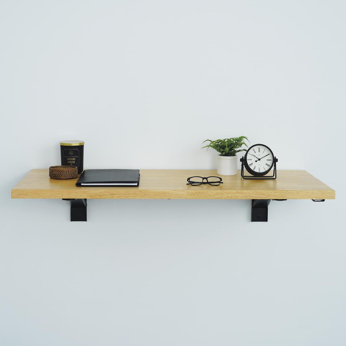 Wall mounted folding workbench holding various items