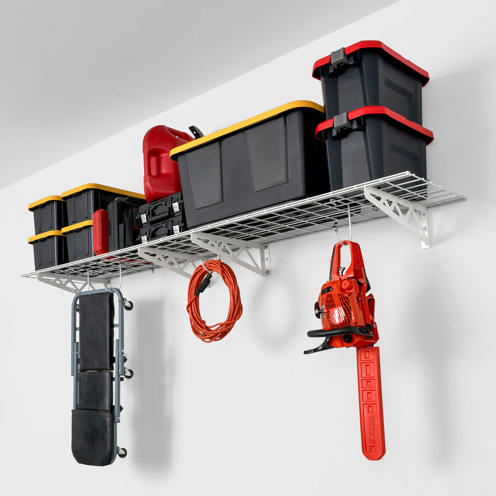 wall mounted shelf full with bins, tools and extension cords
