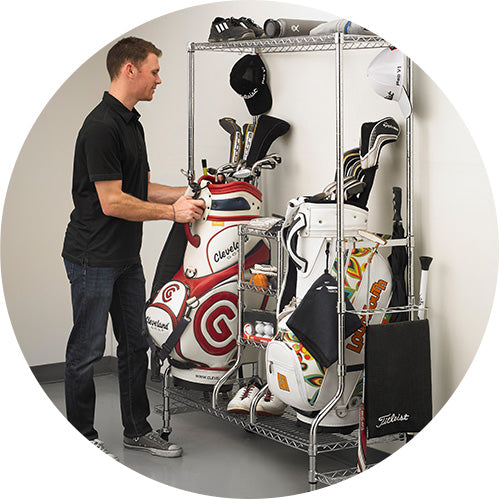 person standing in front of deluxe golf rack with two golf bags