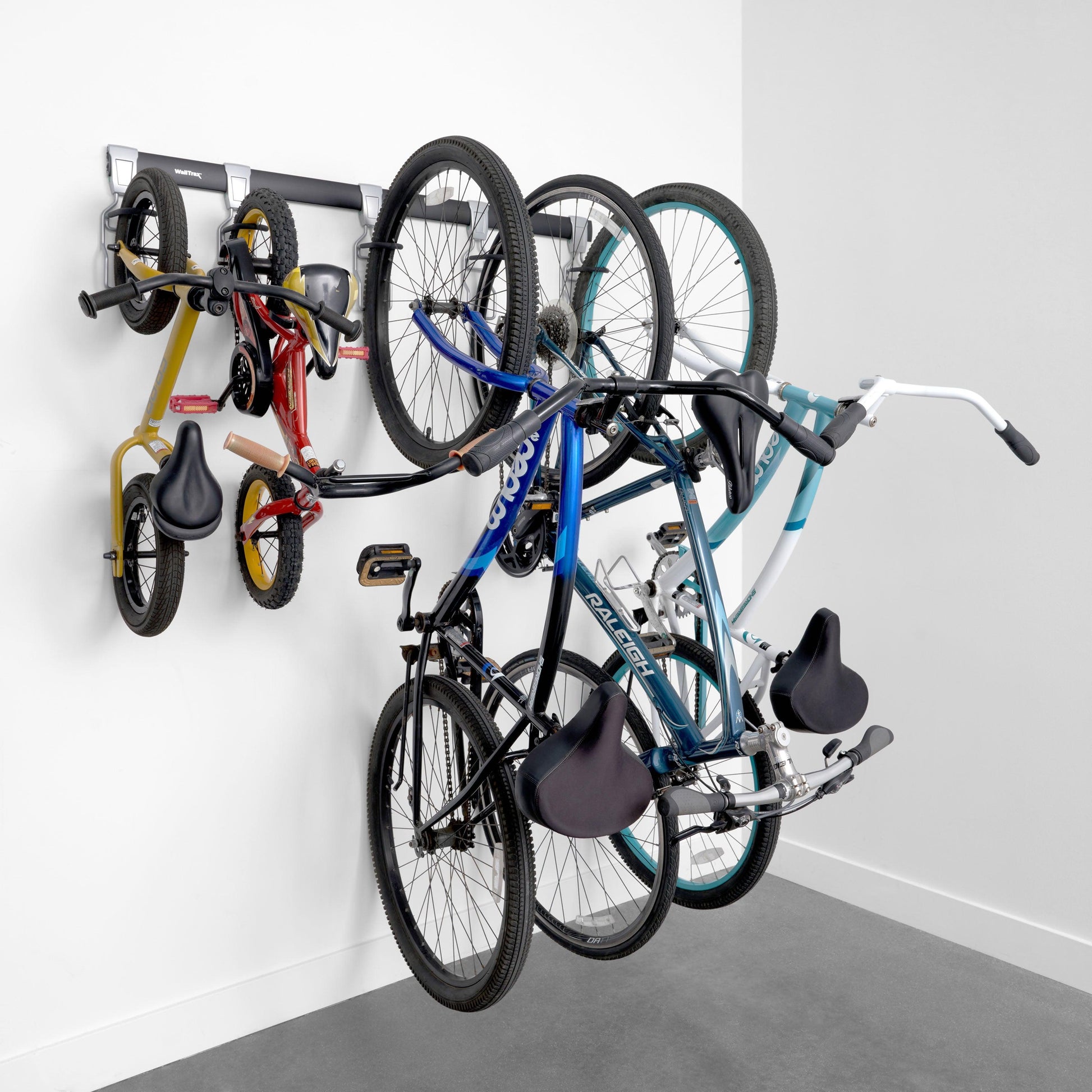 garage track system and adjustable bike hooks loaded with bicycles (7726746599638)