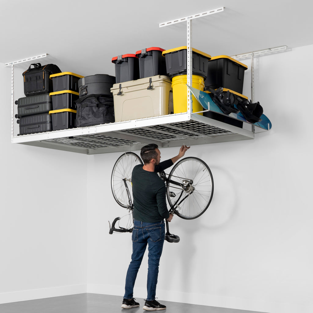 saferacks overhead garage storage rack with storage bins, cooler, bags, and bike hanging from hook