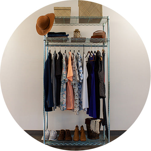 standard clothing rack with clothes and shoes 