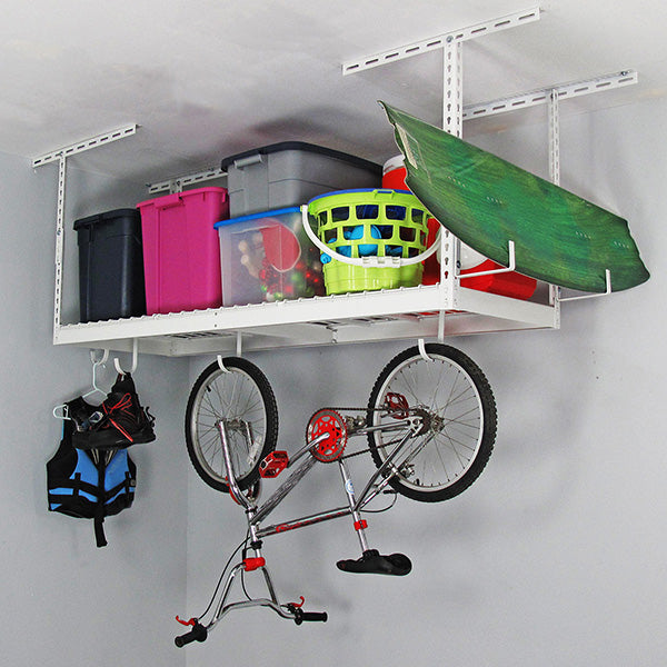 white overhead rack with bicycle and bins